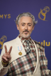 Alan Cumming of The Traitors on the red carpet at the 76th Emmy Awards